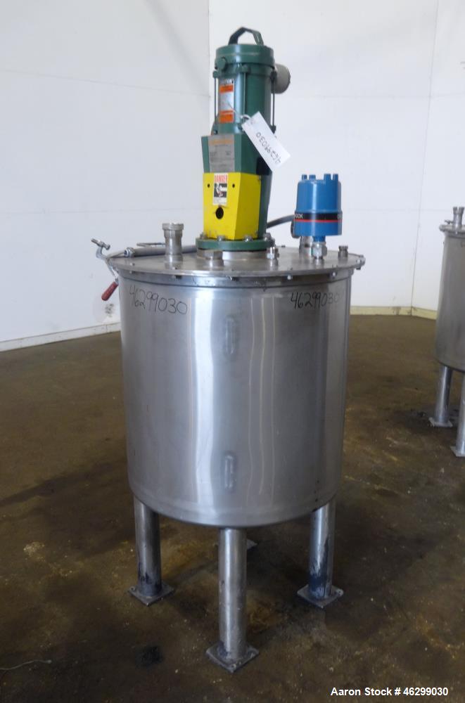 Used Tank, Approximately 80 Gallons, 304 Stainless Steel, Vertical. 30" Diameter x 28" straight side. Bolt-on flat top with 1/3 hinged cover, dished bottom. Top entering Lightnin agitator model XJC-3...