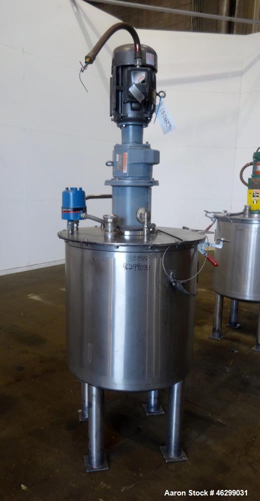 Used Tank, Approximately 80 Gallons, 304 Stainless Steel, Vertical. 30" Diameter x 28" straight side. Bolt-on flat top with 1/3 hinged cover, dished bottom. Top entering agitator, with 2" diameter sh...
