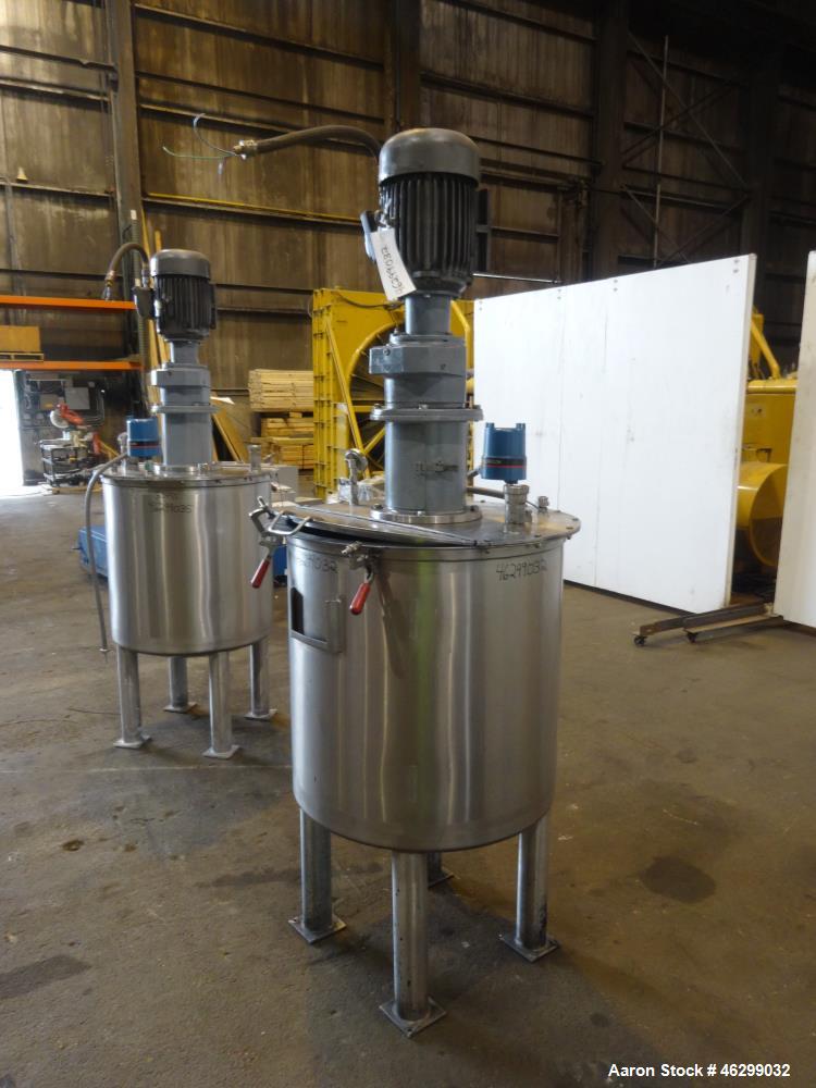 Used Tank, Approximately 80 Gallons, 304 Stainless Steel, Vertical. 30" Diameter x 28" straight side. Bolt-on flat top with 1/3 hinged cover, dished bottom. Top entering agitator, with 2" diameter sh...