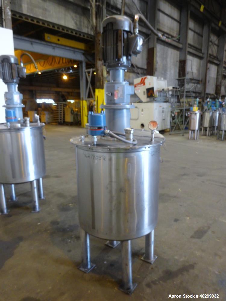 Used Tank, Approximately 80 Gallons, 304 Stainless Steel, Vertical. 30" Diameter x 28" straight side. Bolt-on flat top with 1/3 hinged cover, dished bottom. Top entering agitator, with 2" diameter sh...