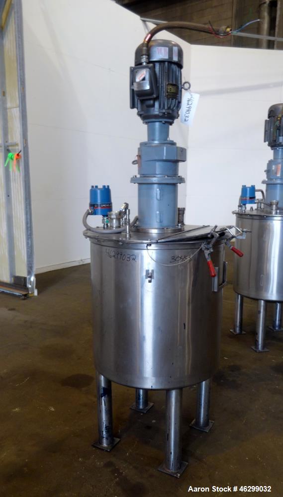 Used Tank, Approximately 80 Gallons, 304 Stainless Steel, Vertical. 30" Diameter x 28" straight side. Bolt-on flat top with 1/3 hinged cover, dished bottom. Top entering agitator, with 2" diameter sh...