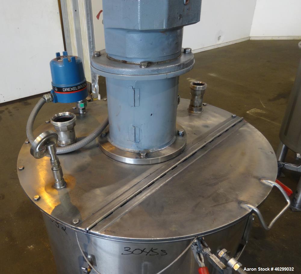 Used Tank, Approximately 80 Gallons, 304 Stainless Steel, Vertical. 30" Diameter x 28" straight side. Bolt-on flat top with 1/3 hinged cover, dished bottom. Top entering agitator, with 2" diameter sh...