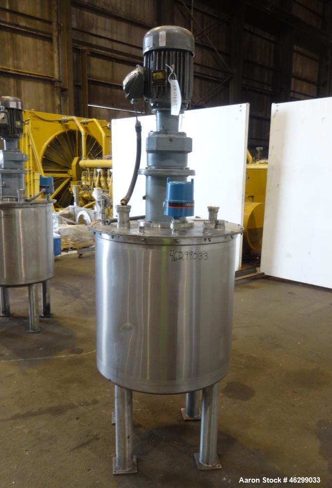 Used Tank, Approximately 80 Gallons, 304 Stainless Steel, Vertical. 30" Diameter x 28" straight side. Bolt-on flat top with 1/3 hinged cover, dished bottom. Top entering agitator, with 2" diameter sh...