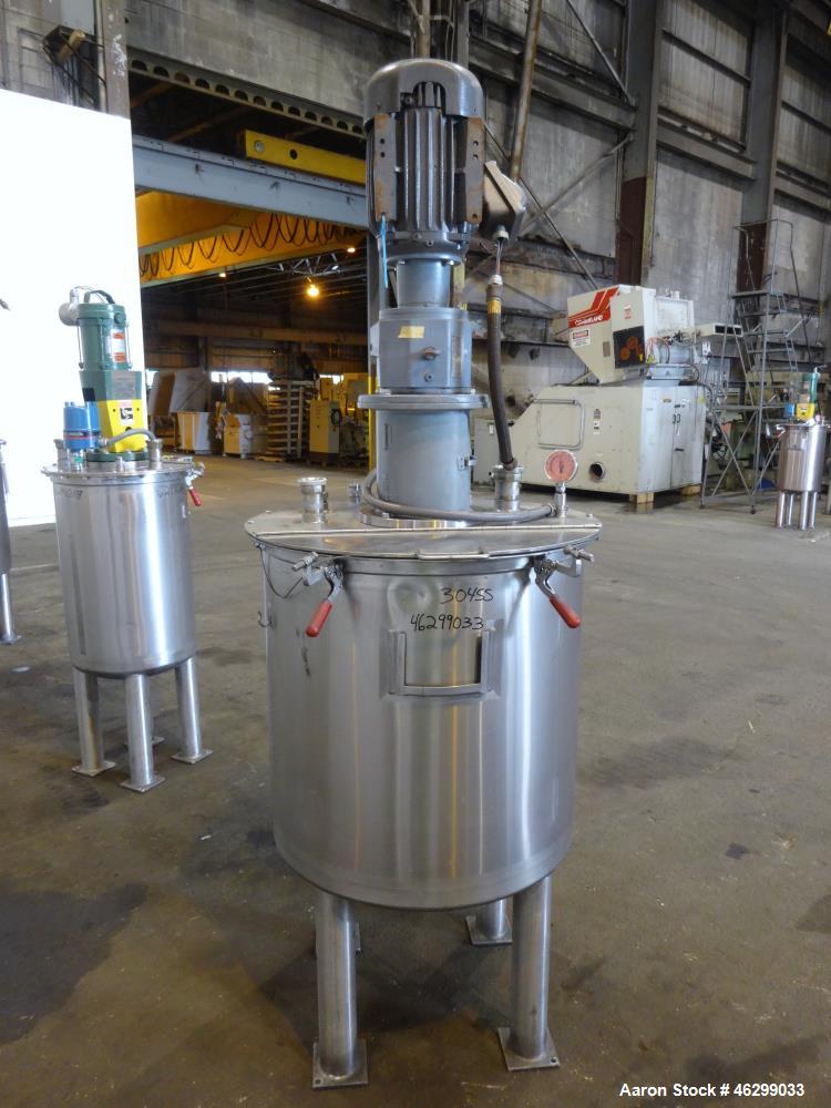 Used Tank, Approximately 80 Gallons, 304 Stainless Steel, Vertical. 30" Diameter x 28" straight side. Bolt-on flat top with 1/3 hinged cover, dished bottom. Top entering agitator, with 2" diameter sh...