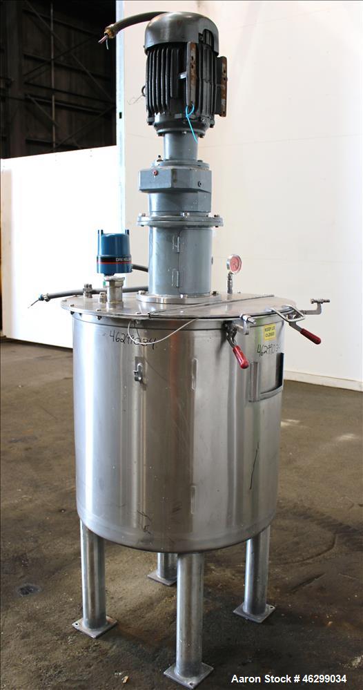 Used Tank, Approximately 80 Gallons, 304 Stainless Steel, Vertical. 30" Diameter x 28" straight side. Bolt-on flat top with 1/3 hinged cover, dished bottom. Top entering agitator, with 2" diameter sh...