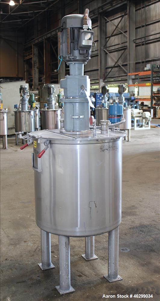 Used Tank, Approximately 80 Gallons, 304 Stainless Steel, Vertical. 30" Diameter x 28" straight side. Bolt-on flat top with 1/3 hinged cover, dished bottom. Top entering agitator, with 2" diameter sh...