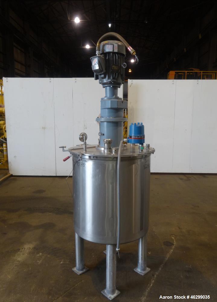 Used Tank, Approximately 80 Gallons, 304 Stainless Steel, Vertical. 30" Diameter x 28" straight side. Bolt-on flat top with 1/3 hinged cover, dished bottom. Top entering agitator, with 2" diameter sh...
