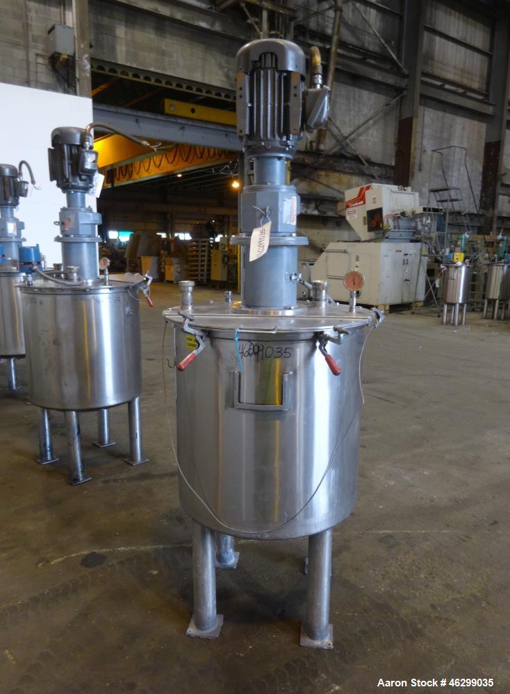 Used Tank, Approximately 80 Gallons, 304 Stainless Steel, Vertical. 30" Diameter x 28" straight side. Bolt-on flat top with 1/3 hinged cover, dished bottom. Top entering agitator, with 2" diameter sh...