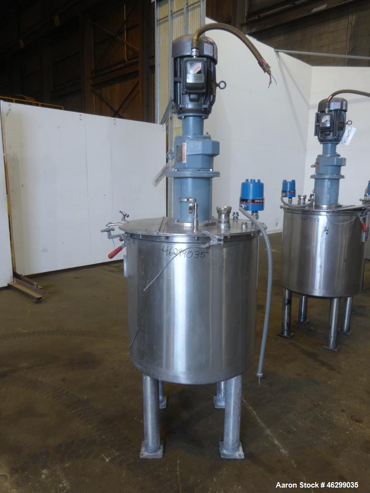 Used Tank, Approximately 80 Gallons, 304 Stainless Steel, Vertical. 30" Diameter x 28" straight side. Bolt-on flat top with 1/3 hinged cover, dished bottom. Top entering agitator, with 2" diameter sh...