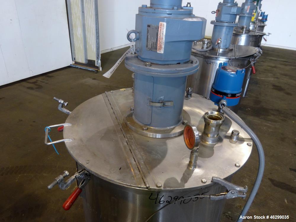 Used Tank, Approximately 80 Gallons, 304 Stainless Steel, Vertical. 30" Diameter x 28" straight side. Bolt-on flat top with 1/3 hinged cover, dished bottom. Top entering agitator, with 2" diameter sh...