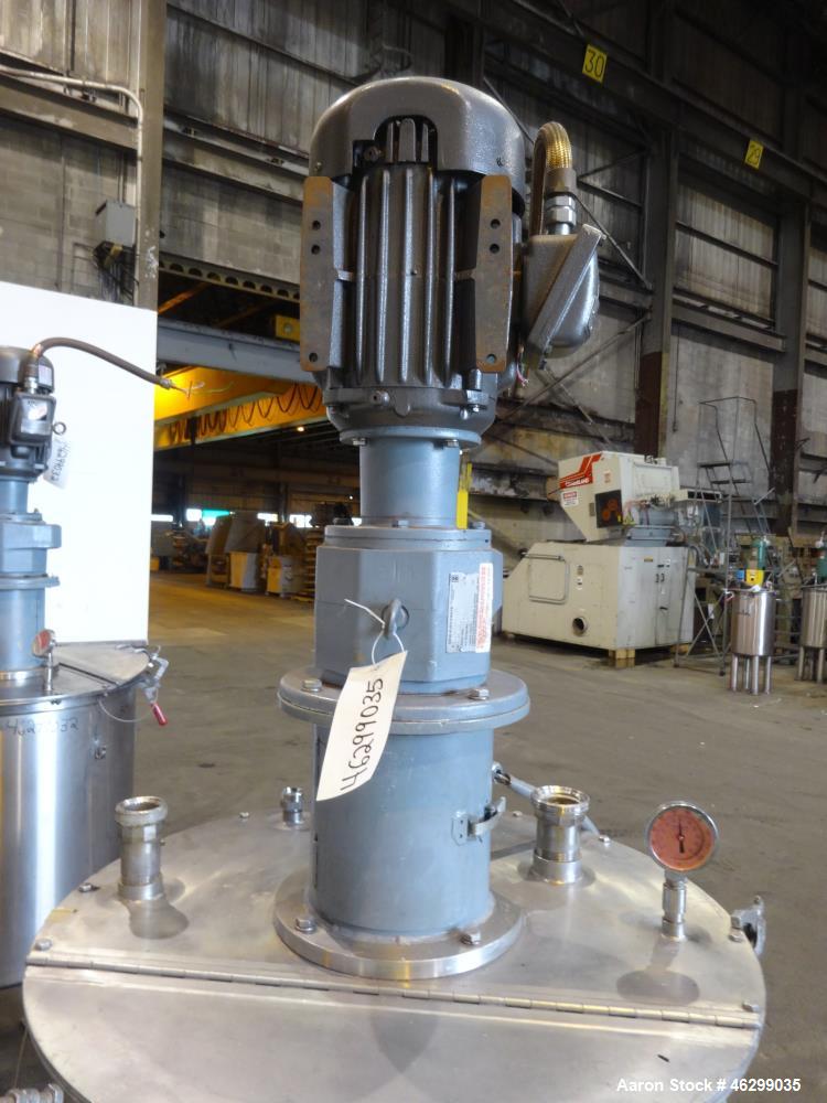 Used Tank, Approximately 80 Gallons, 304 Stainless Steel, Vertical. 30" Diameter x 28" straight side. Bolt-on flat top with 1/3 hinged cover, dished bottom. Top entering agitator, with 2" diameter sh...