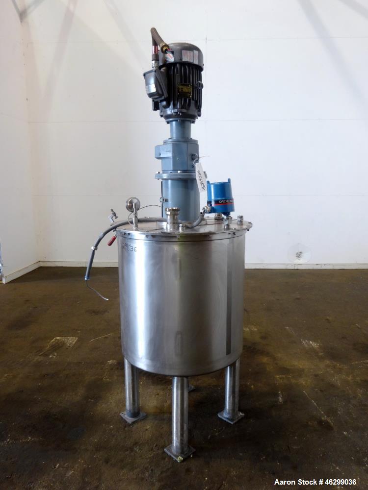 Used Tank, Approximately 80 Gallons, 304 Stainless Steel, Vertical. 30" Diameter x 28" straight side. Bolt-on flat top with 1/3 hinged cover, dished bottom. Top entering agitator, with 2" diameter sh...