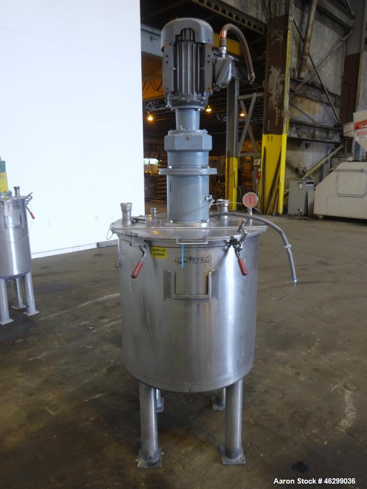 Used Tank, Approximately 80 Gallons, 304 Stainless Steel, Vertical. 30" Diameter x 28" straight side. Bolt-on flat top with 1/3 hinged cover, dished bottom. Top entering agitator, with 2" diameter sh...