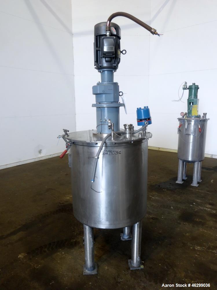 Used Tank, Approximately 80 Gallons, 304 Stainless Steel, Vertical. 30" Diameter x 28" straight side. Bolt-on flat top with 1/3 hinged cover, dished bottom. Top entering agitator, with 2" diameter sh...