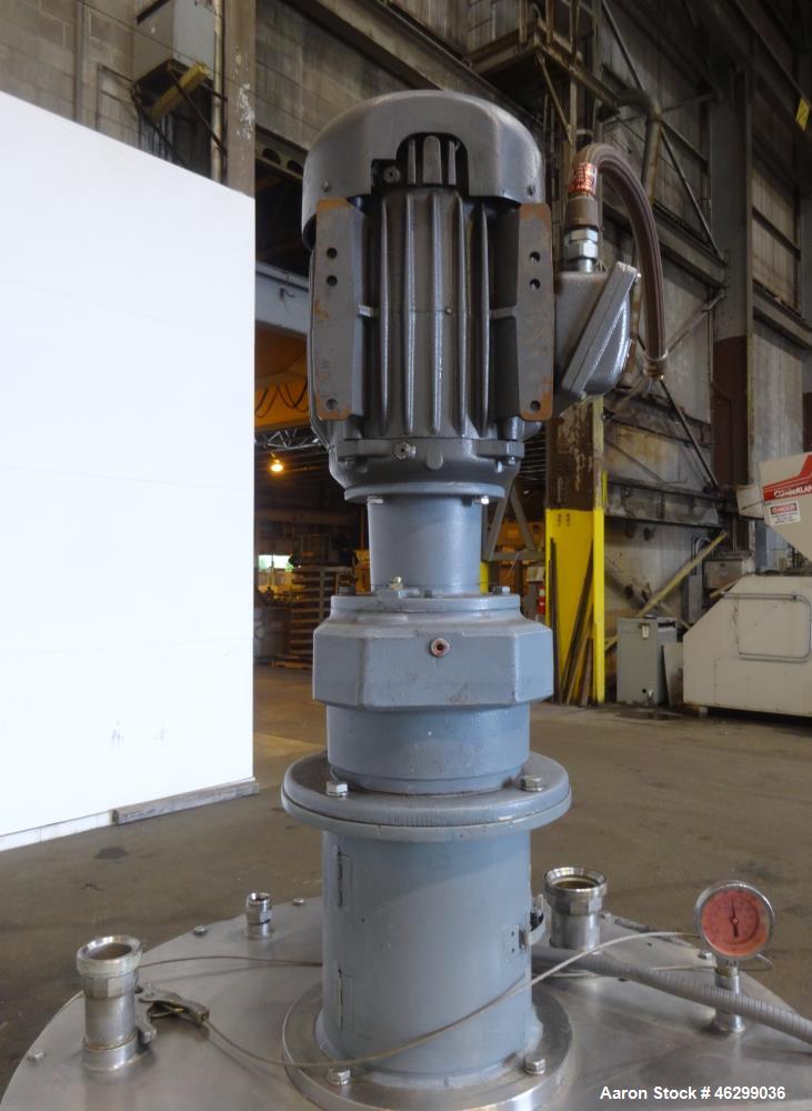 Used Tank, Approximately 80 Gallons, 304 Stainless Steel, Vertical. 30" Diameter x 28" straight side. Bolt-on flat top with 1/3 hinged cover, dished bottom. Top entering agitator, with 2" diameter sh...