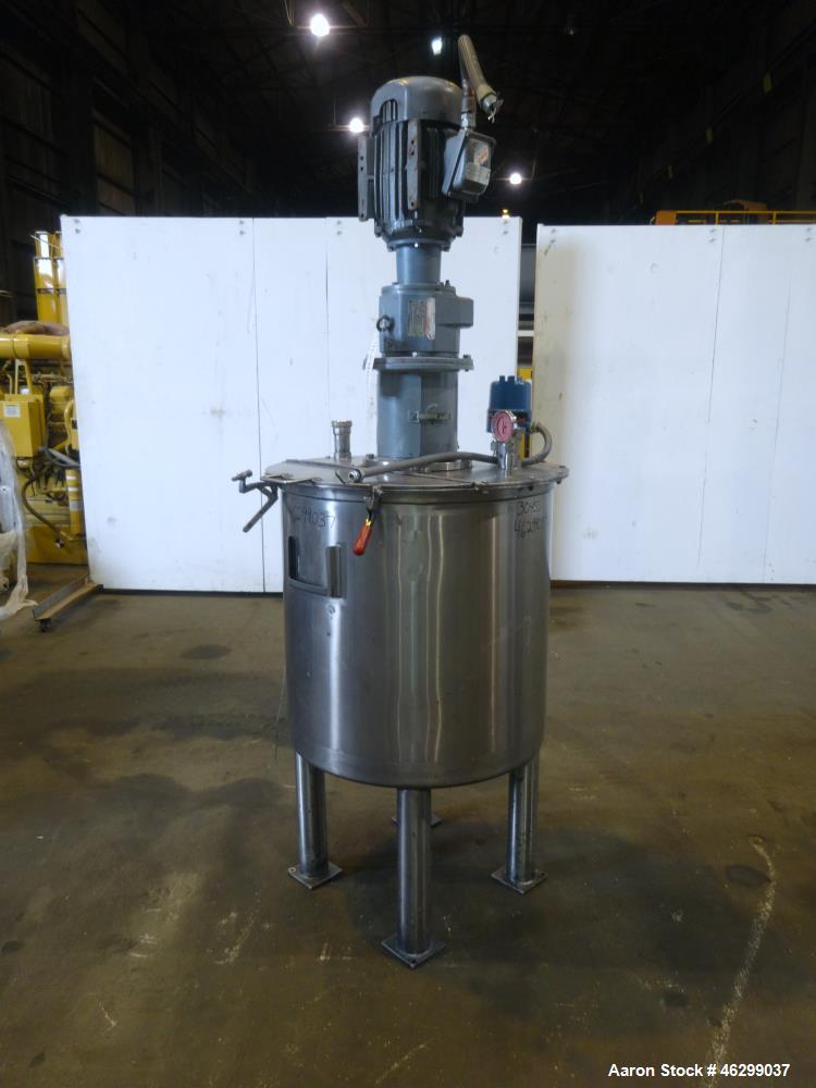 Used Tank, Approximately 80 Gallons, 304 Stainless Steel, Vertical. 30" Diameter x 28" straight side. Bolt-on flat top with 1/3 hinged cover, dished bottom. Top entering agitator, with 2" diameter sh...