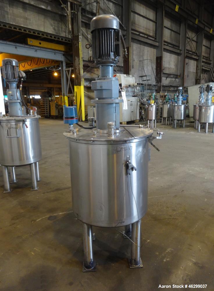 Used Tank, Approximately 80 Gallons, 304 Stainless Steel, Vertical. 30" Diameter x 28" straight side. Bolt-on flat top with 1/3 hinged cover, dished bottom. Top entering agitator, with 2" diameter sh...