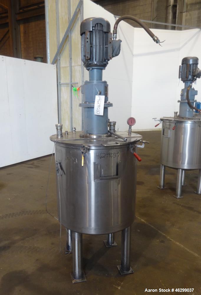 Used Tank, Approximately 80 Gallons, 304 Stainless Steel, Vertical. 30" Diameter x 28" straight side. Bolt-on flat top with 1/3 hinged cover, dished bottom. Top entering agitator, with 2" diameter sh...