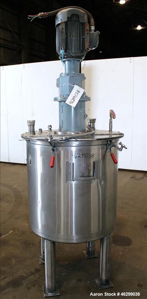 Used Tank, Approximately 80 Gallons, 304 Stainless Steel, Vertical. 30" Diameter x 28" straight side. Bolt-on flat top with 1/3 hinged cover, dished bottom. Top entering agitator, with 2" diameter sh...