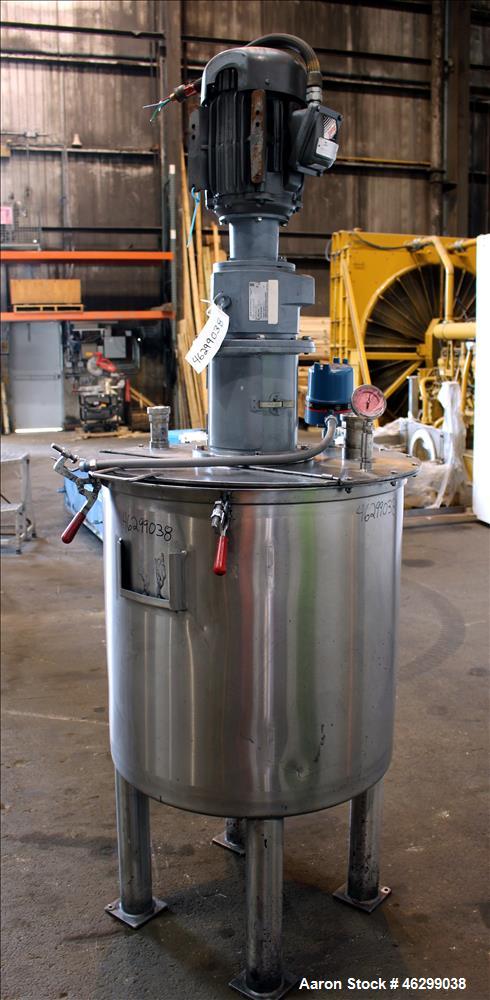 Used Tank, Approximately 80 Gallons, 304 Stainless Steel, Vertical. 30" Diameter x 28" straight side. Bolt-on flat top with 1/3 hinged cover, dished bottom. Top entering agitator, with 2" diameter sh...