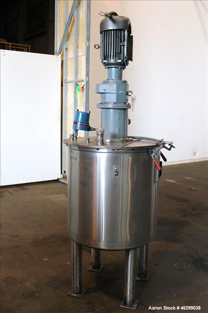 Used Tank, Approximately 80 Gallons, 304 Stainless Steel, Vertical. 30" Diameter x 28" straight side. Bolt-on flat top with 1/3 hinged cover, dished bottom. Top entering agitator, with 2" diameter sh...