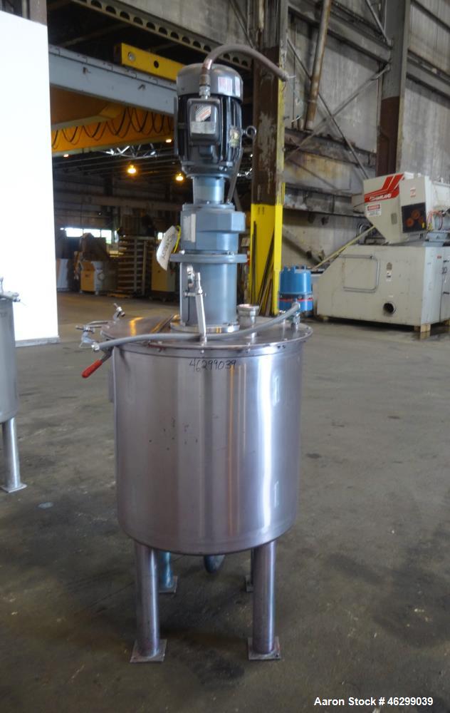 Used Tank, Approximately 80 Gallons, 304 Stainless Steel, Vertical. 30" Diameter x 28" straight side. Bolt-on flat top with 1/3 hinged cover, dished bottom. Top entering agitator, with 2" diameter sh...