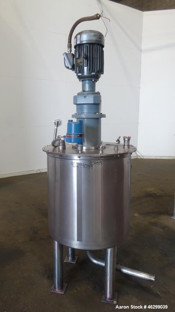 Used Tank, Approximately 80 Gallons, 304 Stainless Steel, Vertical. 30" Diameter x 28" straight side. Bolt-on flat top with 1/3 hinged cover, dished bottom. Top entering agitator, with 2" diameter sh...