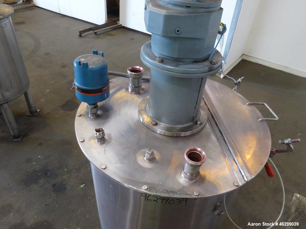 Used Tank, Approximately 80 Gallons, 304 Stainless Steel, Vertical. 30" Diameter x 28" straight side. Bolt-on flat top with 1/3 hinged cover, dished bottom. Top entering agitator, with 2" diameter sh...