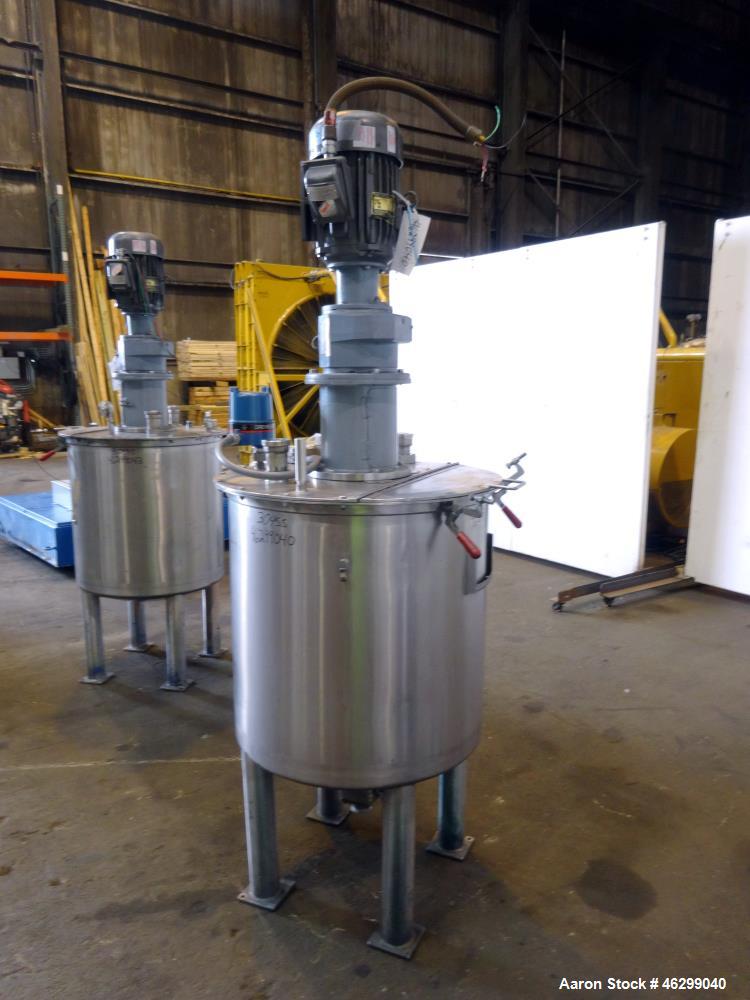 Used Tank, Approximately 80 Gallons, 304 Stainless Steel, Vertical. 30" Diameter x 28" straight side. Bolt-on flat top with 1/3 hinged cover, dished bottom. Top entering agitator, with 2" diameter sh...