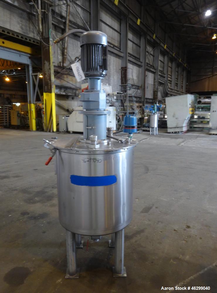 Used Tank, Approximately 80 Gallons, 304 Stainless Steel, Vertical. 30" Diameter x 28" straight side. Bolt-on flat top with 1/3 hinged cover, dished bottom. Top entering agitator, with 2" diameter sh...
