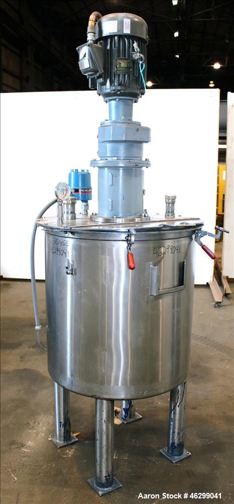 Used Tank, Approximately 80 Gallons, 304 Stainless Steel, Vertical. 30" Diameter x 28" straight side. Bolt-on flat top with 1/3 hinged cover, dished bottom. Top entering agitator, with 2" diameter sh...