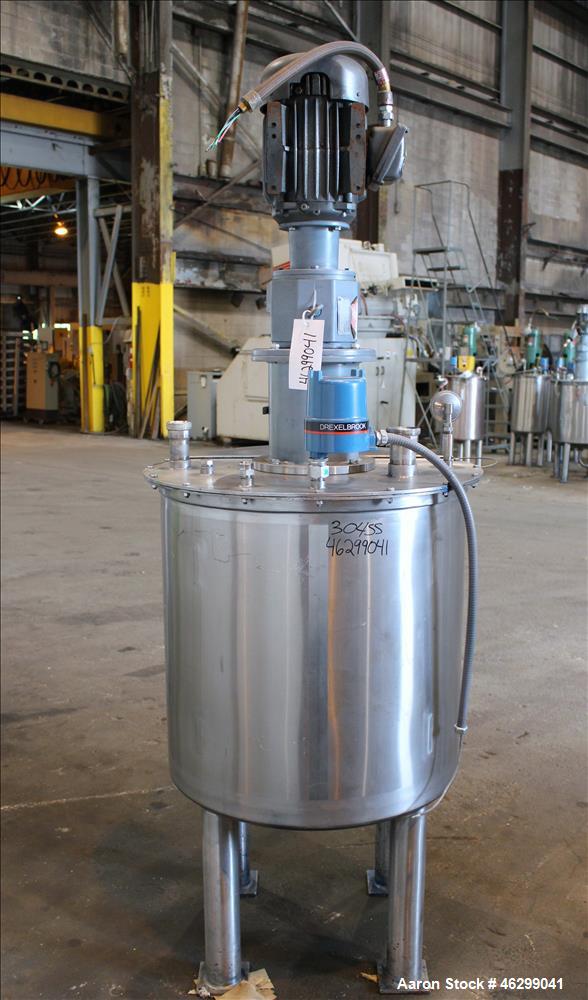 Used Tank, Approximately 80 Gallons, 304 Stainless Steel, Vertical. 30" Diameter x 28" straight side. Bolt-on flat top with 1/3 hinged cover, dished bottom. Top entering agitator, with 2" diameter sh...