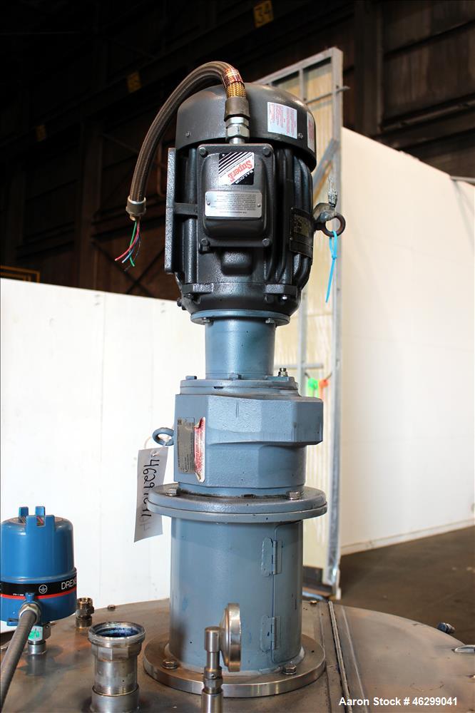 Used Tank, Approximately 80 Gallons, 304 Stainless Steel, Vertical. 30" Diameter x 28" straight side. Bolt-on flat top with 1/3 hinged cover, dished bottom. Top entering agitator, with 2" diameter sh...