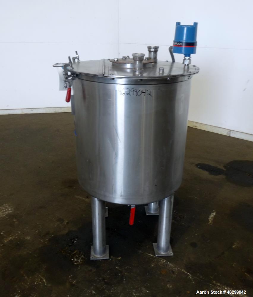 Used Tank, Approximately 80 Gallons, 304 Stainless Steel, Vertical. 30" Diameter x 28" straight side. Bolt-on flat top with 1/3 hinged cover, dished bottom. (4) Sidewall baffles. 1-1/2" Tri-clamp cen...
