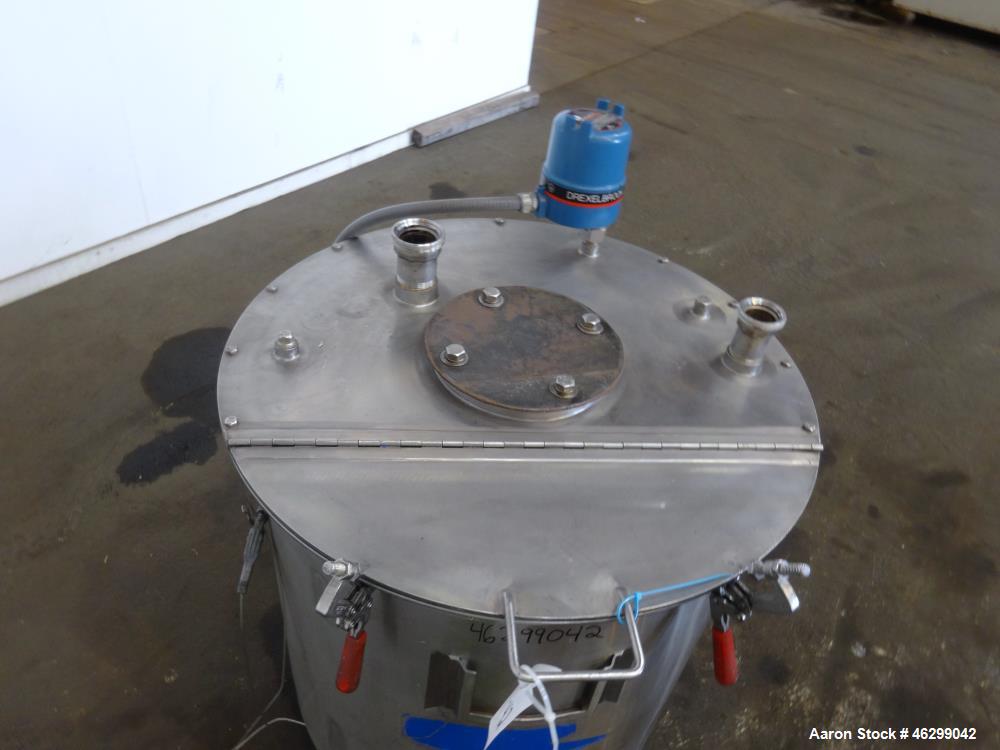 Used Tank, Approximately 80 Gallons, 304 Stainless Steel, Vertical. 30" Diameter x 28" straight side. Bolt-on flat top with 1/3 hinged cover, dished bottom. (4) Sidewall baffles. 1-1/2" Tri-clamp cen...