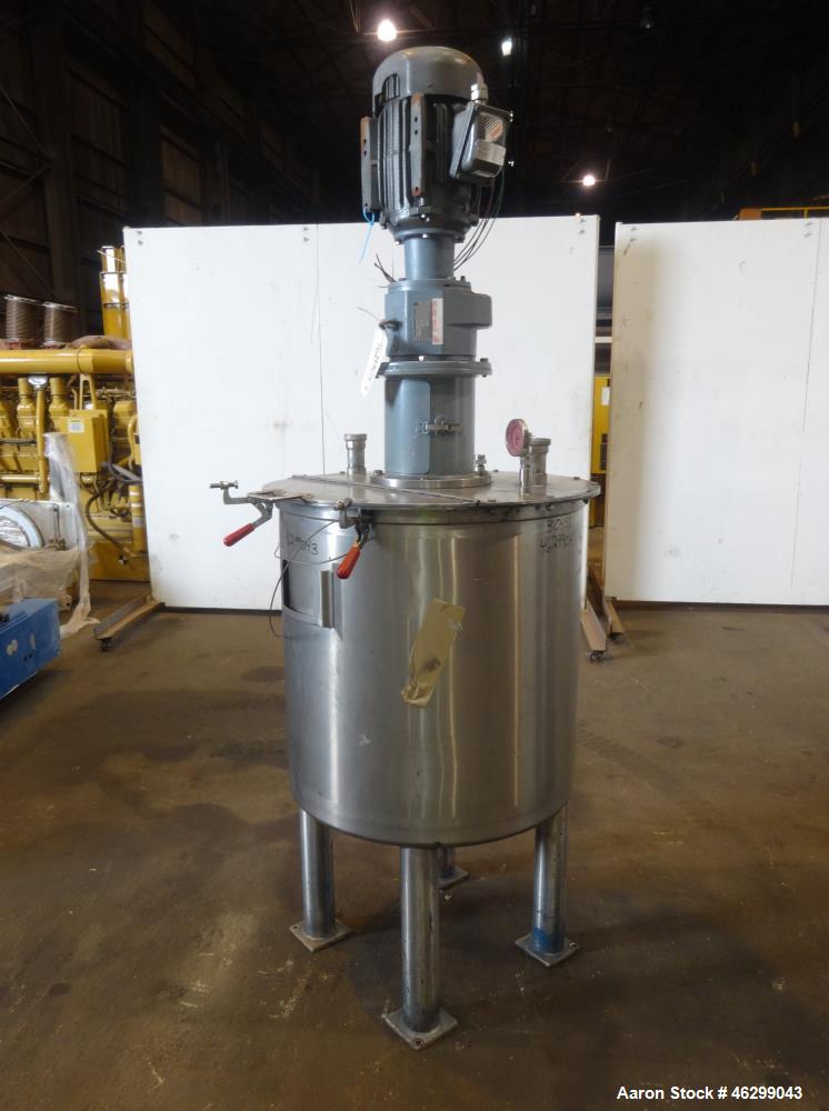 Used Tank, Approximately 80 Gallons, 304 Stainless Steel, Vertical. 30" Diameter x 28" straight side. Bolt-on flat top with 1/3 hinged cover, dished bottom. Top entering agitator, with 2" diameter sh...