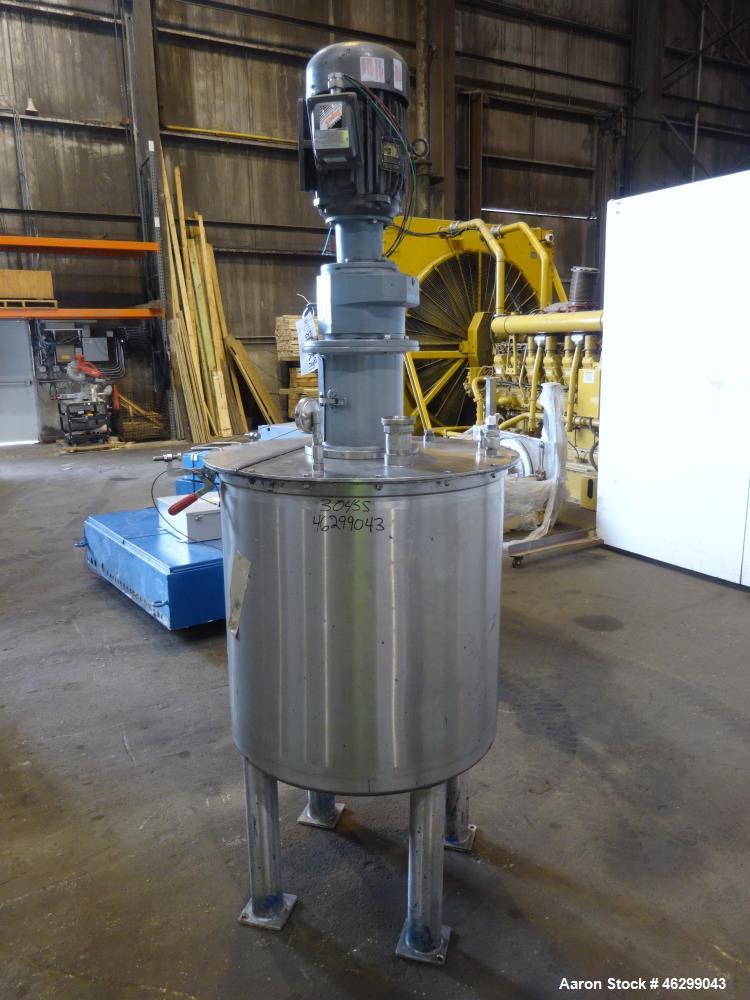 Used Tank, Approximately 80 Gallons, 304 Stainless Steel, Vertical. 30" Diameter x 28" straight side. Bolt-on flat top with 1/3 hinged cover, dished bottom. Top entering agitator, with 2" diameter sh...
