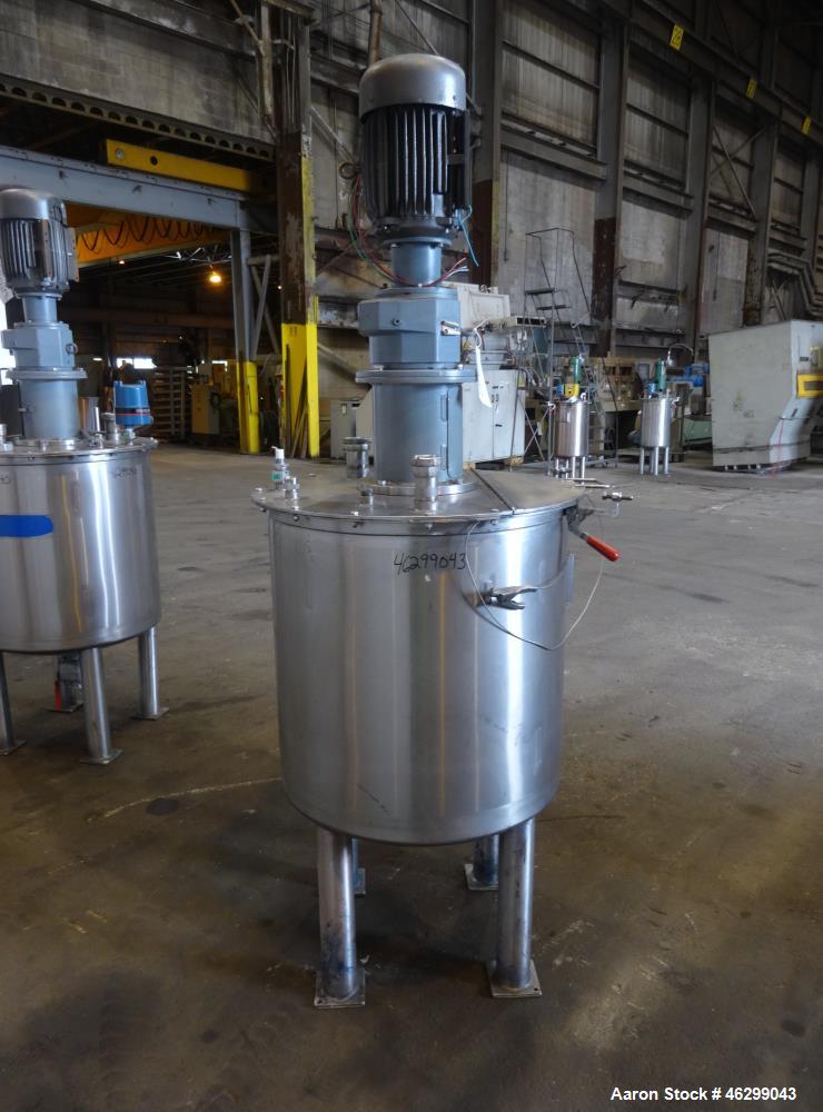 Used Tank, Approximately 80 Gallons, 304 Stainless Steel, Vertical. 30" Diameter x 28" straight side. Bolt-on flat top with 1/3 hinged cover, dished bottom. Top entering agitator, with 2" diameter sh...
