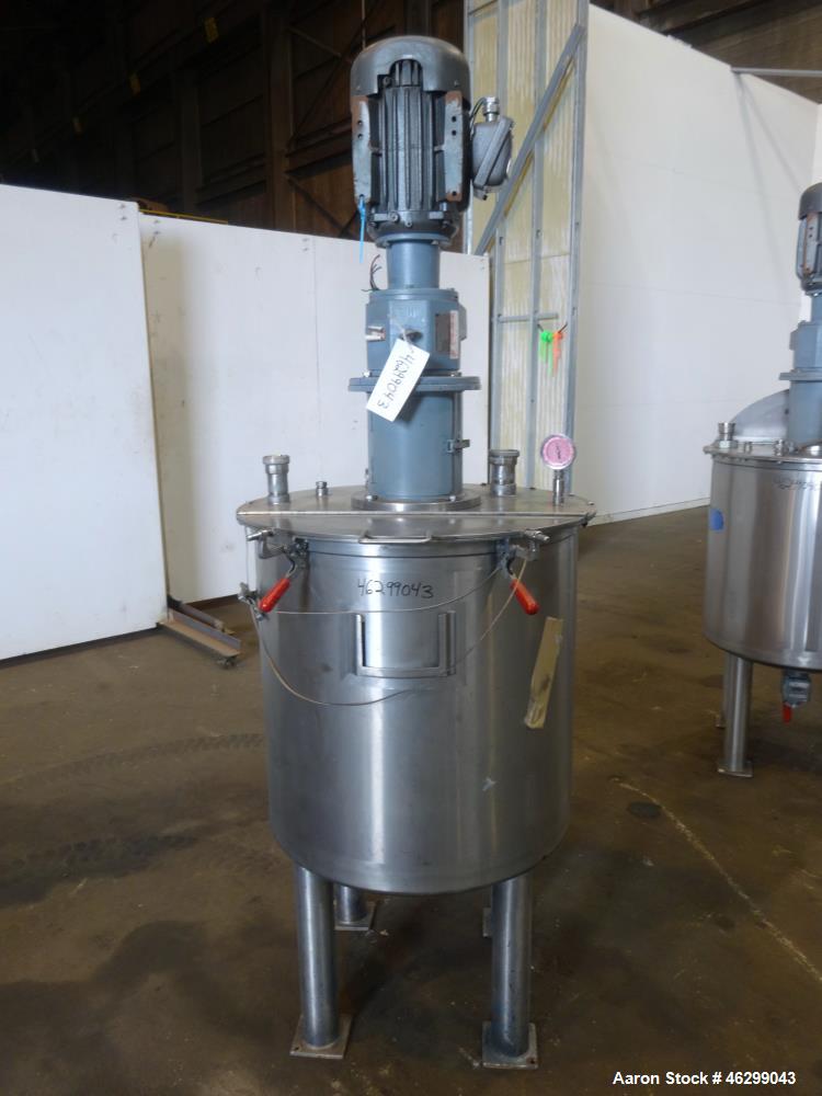 Used Tank, Approximately 80 Gallons, 304 Stainless Steel, Vertical. 30" Diameter x 28" straight side. Bolt-on flat top with 1/3 hinged cover, dished bottom. Top entering agitator, with 2" diameter sh...