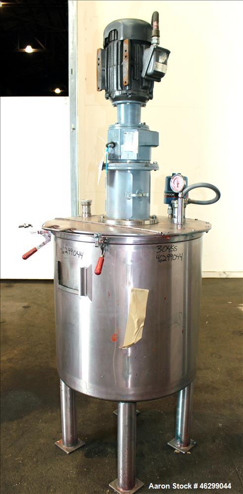 Used Tank, Approximately 80 Gallons, 304 Stainless Steel, Vertical. 30" Diameter x 28" straight side. Bolt-on flat top with 1/3 hinged cover, dished bottom. Top entering agitator, with 2" diameter sh...