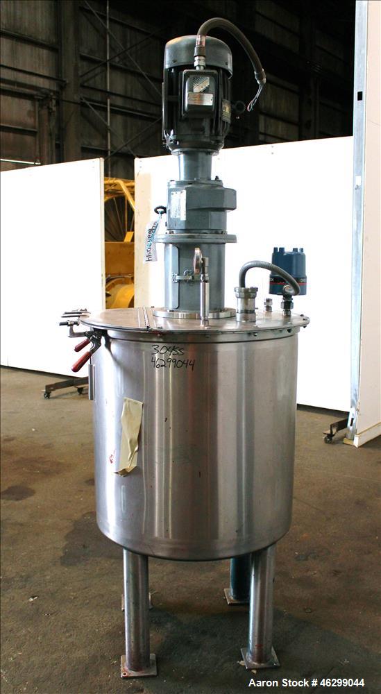 Used Tank, Approximately 80 Gallons, 304 Stainless Steel, Vertical. 30" Diameter x 28" straight side. Bolt-on flat top with 1/3 hinged cover, dished bottom. Top entering agitator, with 2" diameter sh...