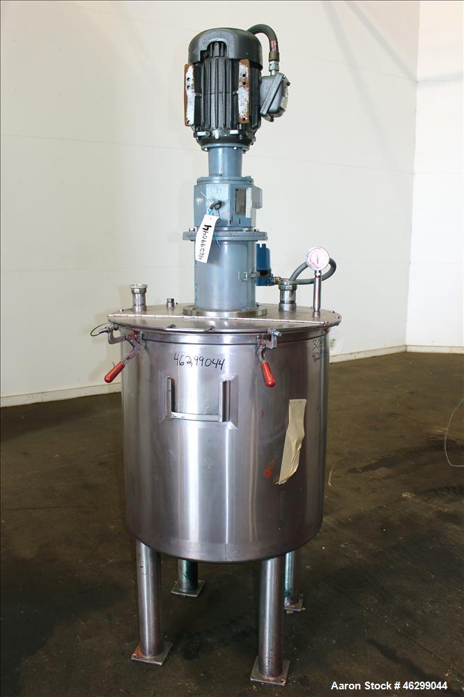 Used Tank, Approximately 80 Gallons, 304 Stainless Steel, Vertical. 30" Diameter x 28" straight side. Bolt-on flat top with 1/3 hinged cover, dished bottom. Top entering agitator, with 2" diameter sh...