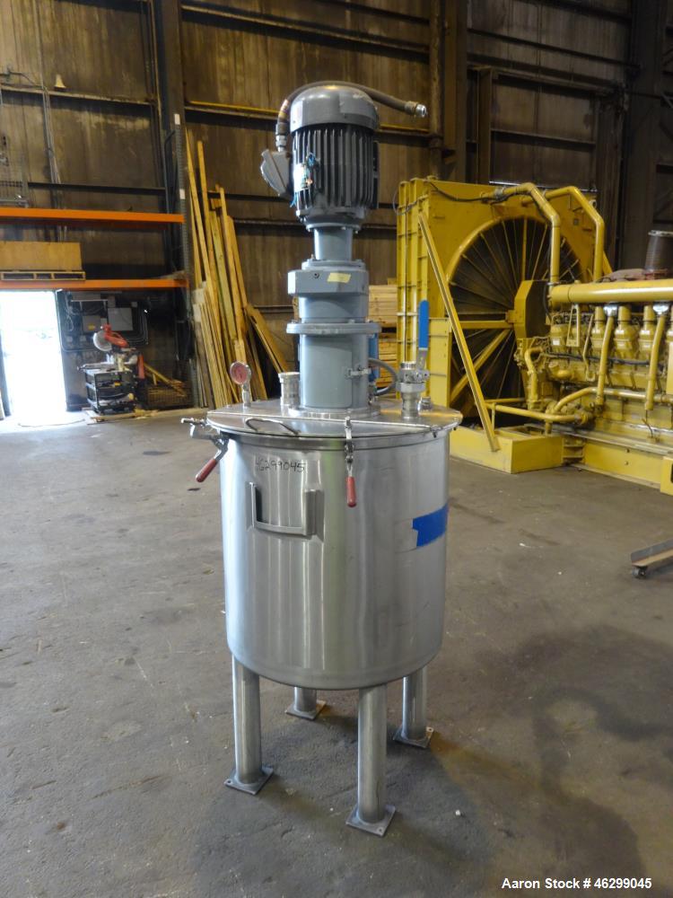 Used Tank, Approximately 80 Gallons, 304 Stainless Steel, Vertical. 30" Diameter x 28" straight side. Bolt-on flat top with 1/3 hinged cover, dished bottom. Top entering agitator, with 2" diameter sh...