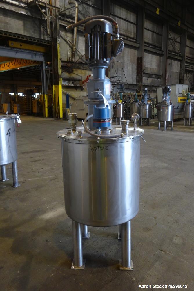Used Tank, Approximately 80 Gallons, 304 Stainless Steel, Vertical. 30" Diameter x 28" straight side. Bolt-on flat top with 1/3 hinged cover, dished bottom. Top entering agitator, with 2" diameter sh...