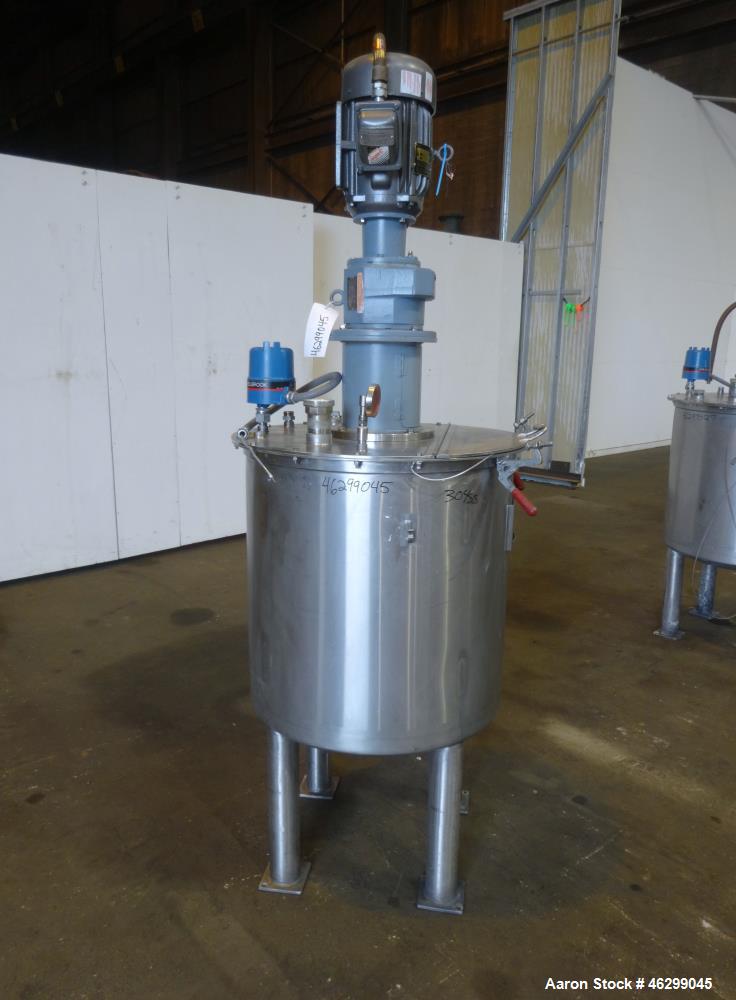 Used Tank, Approximately 80 Gallons, 304 Stainless Steel, Vertical. 30" Diameter x 28" straight side. Bolt-on flat top with 1/3 hinged cover, dished bottom. Top entering agitator, with 2" diameter sh...