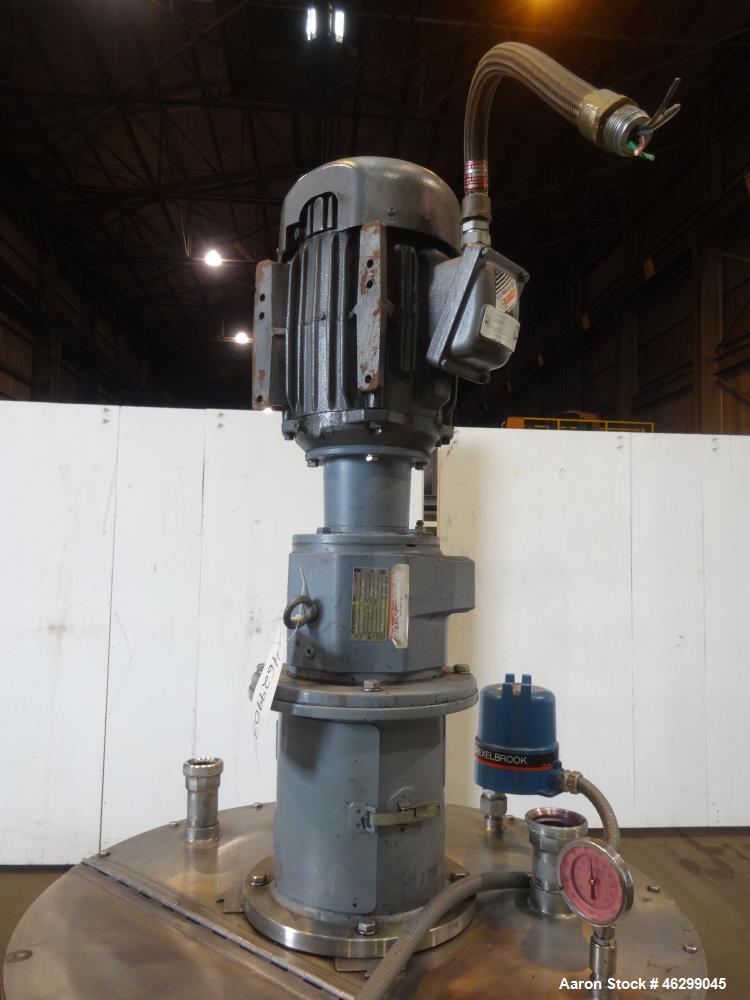 Used Tank, Approximately 80 Gallons, 304 Stainless Steel, Vertical. 30" Diameter x 28" straight side. Bolt-on flat top with 1/3 hinged cover, dished bottom. Top entering agitator, with 2" diameter sh...