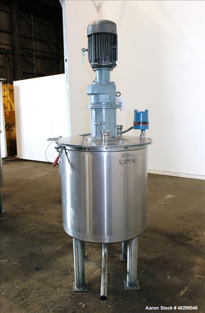 Used Tank, Approximately 80 Gallons, 304 Stainless Steel, Vertical. 30" Diameter x 28" straight side. Bolt-on flat top with 1/3 hinged cover, dished bottom. Top entering agitator, with 2" diameter sh...
