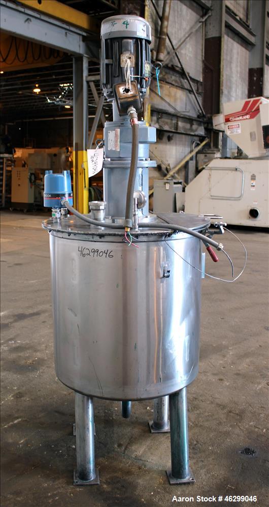Used Tank, Approximately 80 Gallons, 304 Stainless Steel, Vertical. 30" Diameter x 28" straight side. Bolt-on flat top with 1/3 hinged cover, dished bottom. Top entering agitator, with 2" diameter sh...