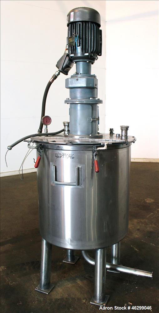 Used Tank, Approximately 80 Gallons, 304 Stainless Steel, Vertical. 30" Diameter x 28" straight side. Bolt-on flat top with 1/3 hinged cover, dished bottom. Top entering agitator, with 2" diameter sh...