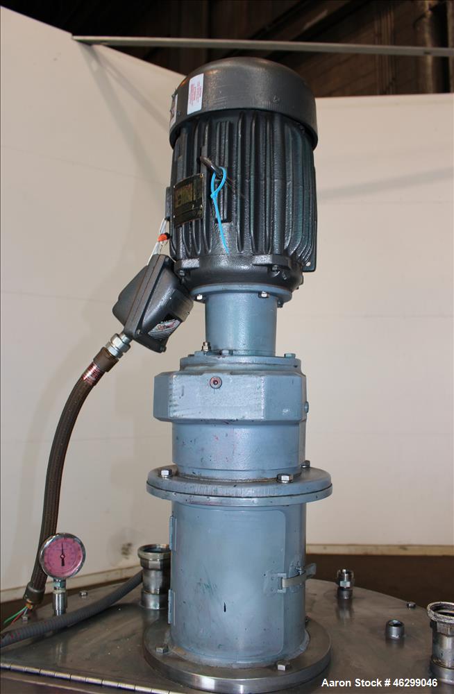 Used Tank, Approximately 80 Gallons, 304 Stainless Steel, Vertical. 30" Diameter x 28" straight side. Bolt-on flat top with 1/3 hinged cover, dished bottom. Top entering agitator, with 2" diameter sh...